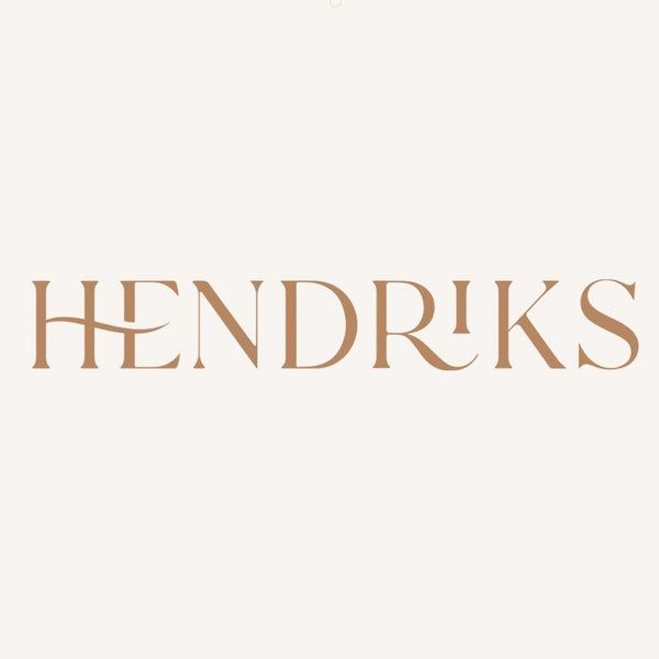 HENDRIKS logo in elegant brown serif font on light beige background